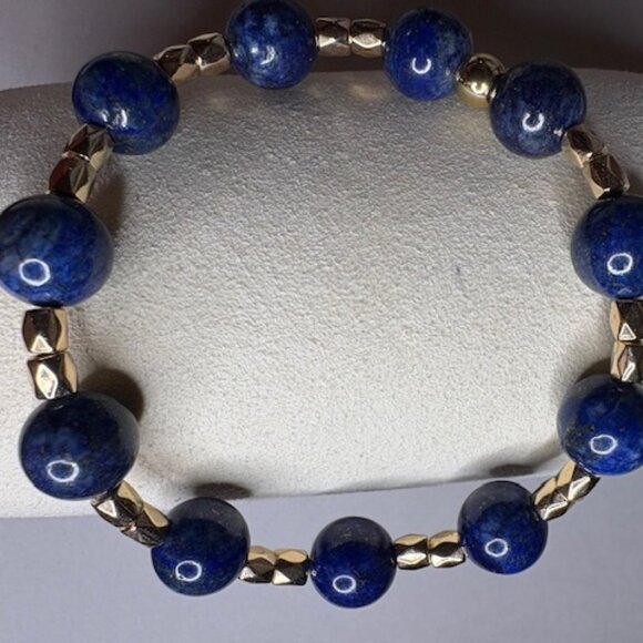 bracelet features polished deep navy-blue gemstone beads - Picture 3 of 3